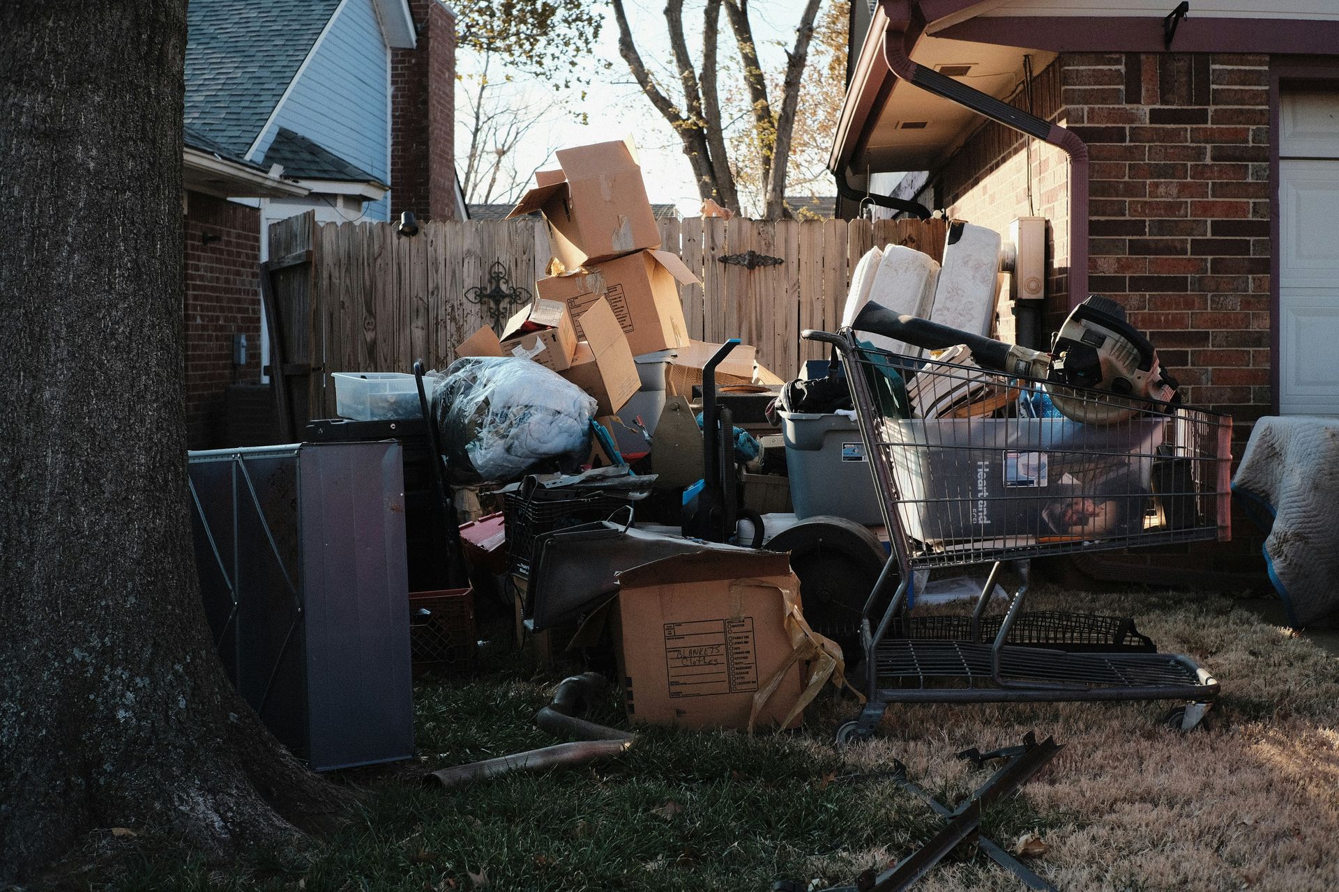 a pile of garbage outside a house